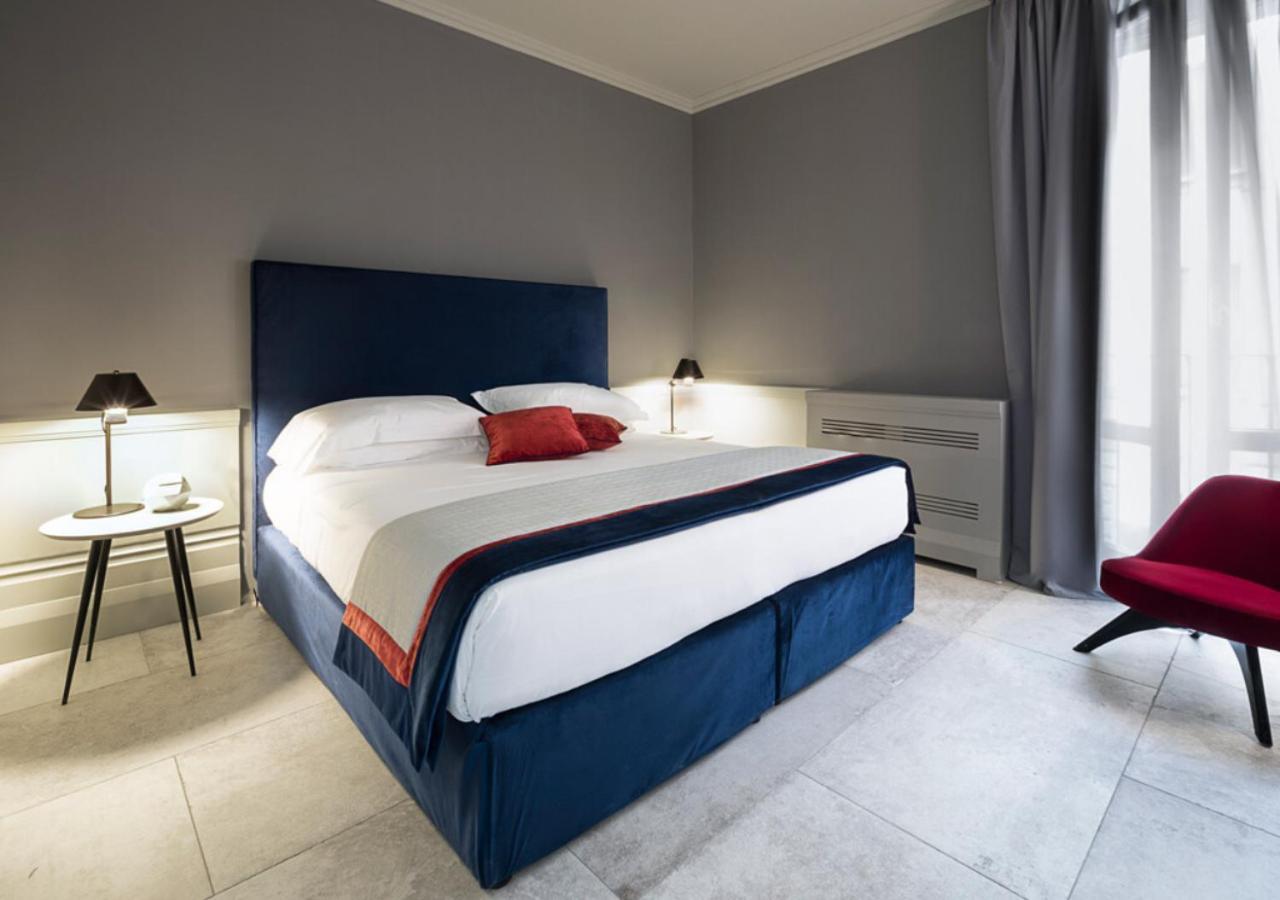 Palazzo Cornalia Hotel Milan Exterior photo A bedroom at the hotel
