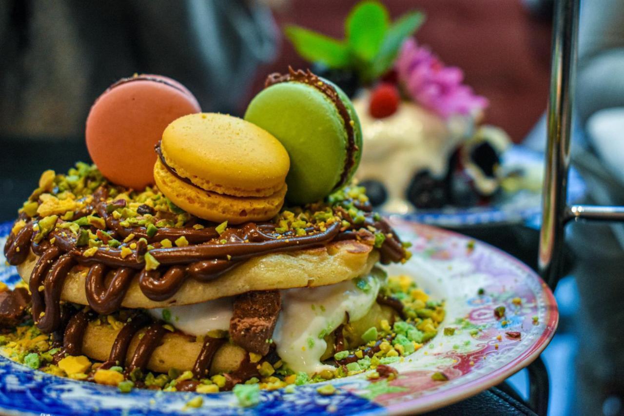 Palazzo Cornalia Hotel Milan Exterior photo A mille-feuille with macarons