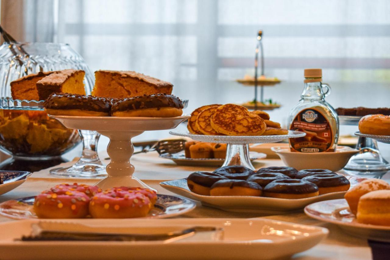 Palazzo Cornalia Hotel Milan Exterior photo A selection of desserts