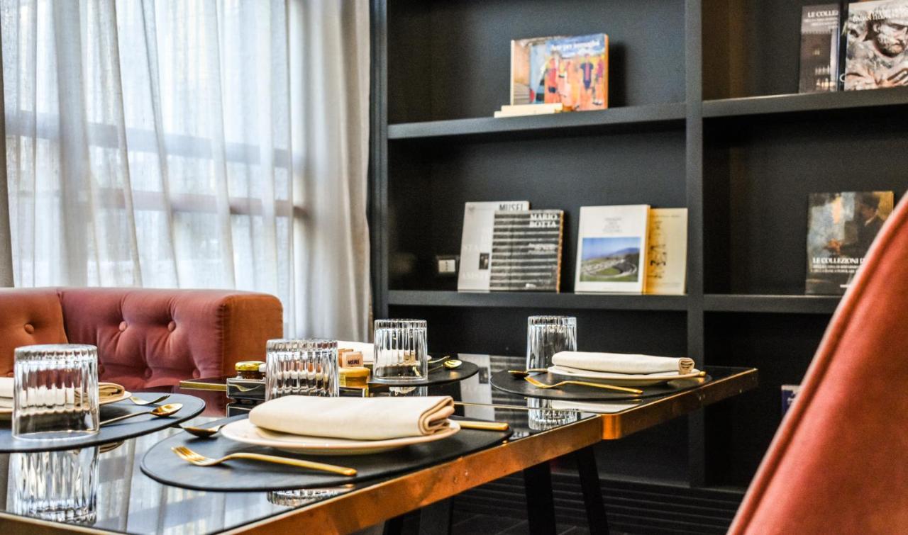 Palazzo Cornalia Hotel Milan Exterior photo A table set for dinner