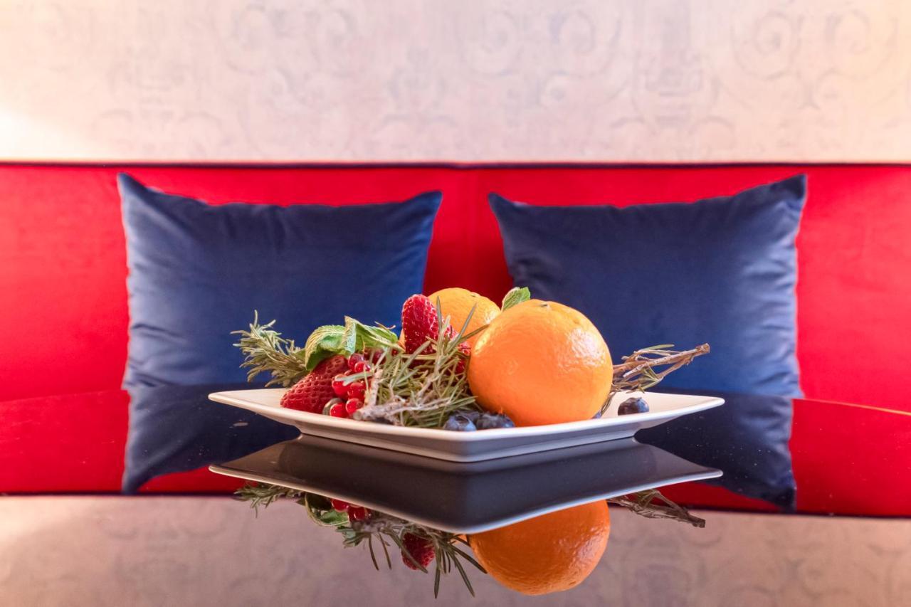Palazzo Cornalia Hotel Milan Exterior photo A fruit salad
