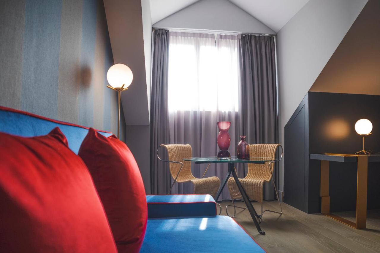 Palazzo Cornalia Hotel Milan Exterior photo A room at the hotel