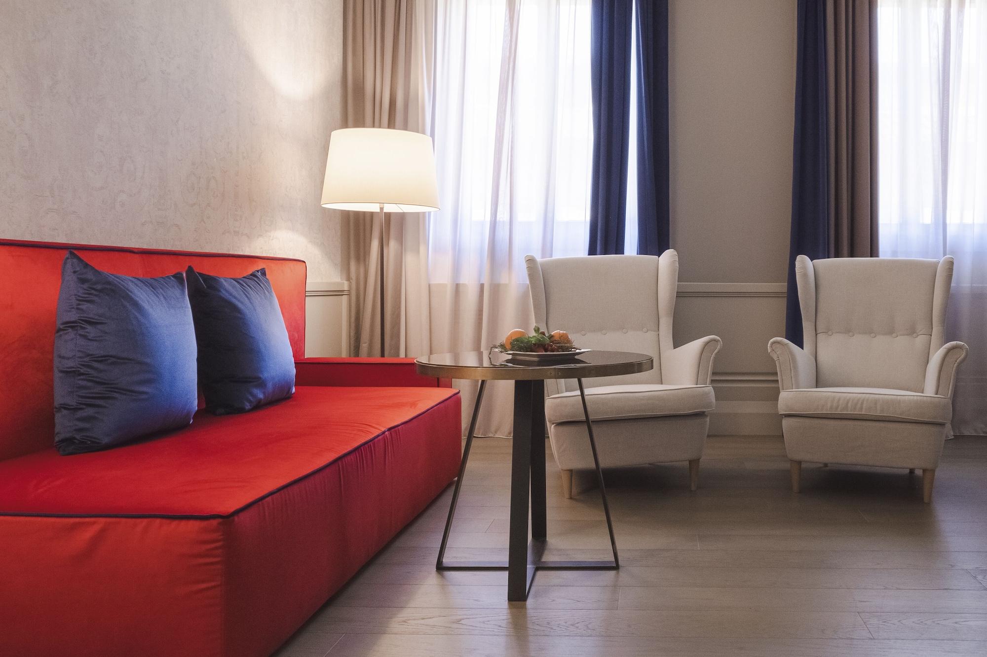 Palazzo Cornalia Hotel Milan Exterior photo A suite at the Hotel