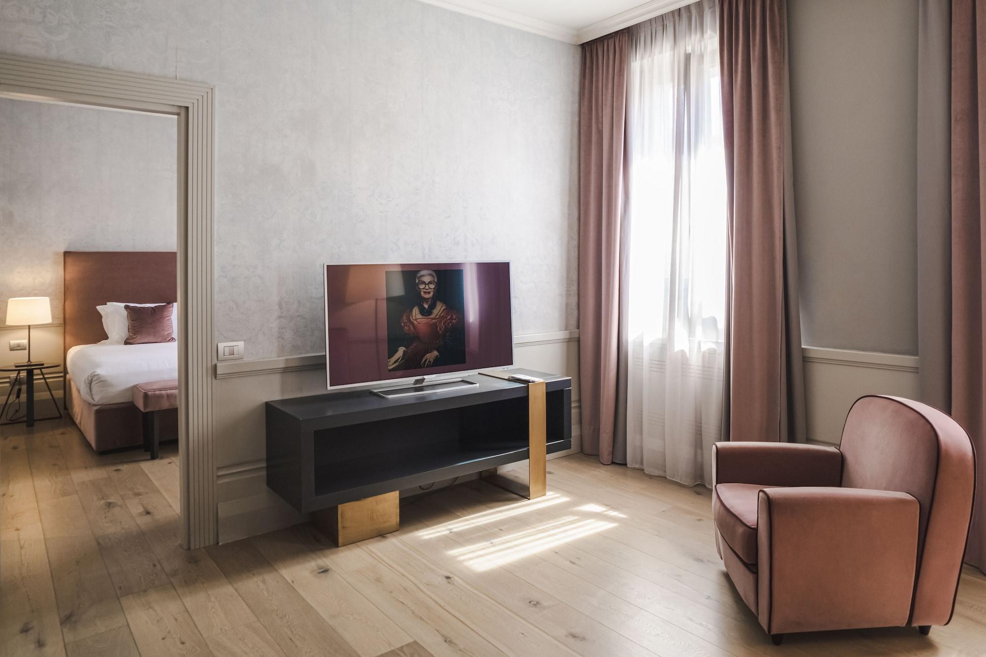 Palazzo Cornalia Hotel Milan Exterior photo A suite at the hotel