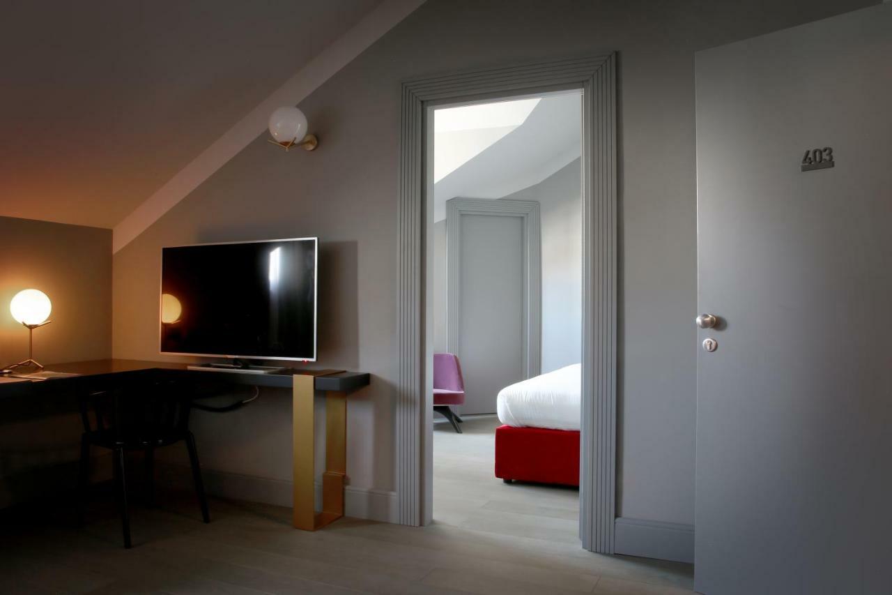 Palazzo Cornalia Hotel Milan Exterior photo A room at the hotel