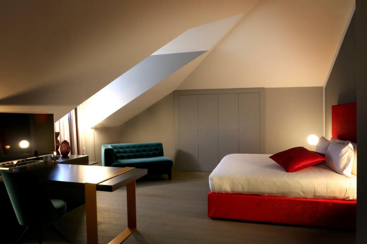 Palazzo Cornalia Hotel Milan Exterior photo A room at the hotel
